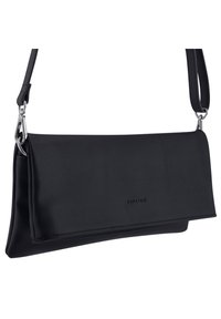 Černá kožená krosbody taška s skládací klopou, stříbrným kováním a emblémem "EXPATRIÉ". Hladký povrch a minimalistický design.