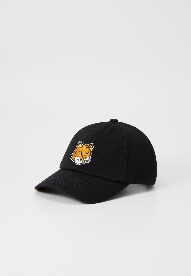 Black cap with a curved bill, featuring an orange embroidered fox face on the front. Fabric has a textured finish.