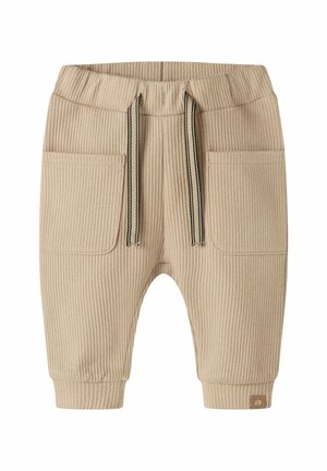 Pantalon bébé côtelé beige avec taille élastique, cordons rayés noirs, deux poches avant et chevilles retroussées.