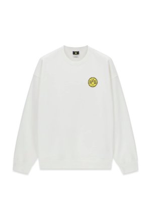 Biała bluza z okrągłym dekoltem, długimi rękawami i małym żółtym logo Borussia Dortmund BVB 09 na lewej piersi.