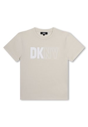 T-shirt court à manches courtes beige clair en mélange de coton, arborant un logo "DKNY" blanc audacieux sur le devant. Encolure ras du cou, coupe standard.
