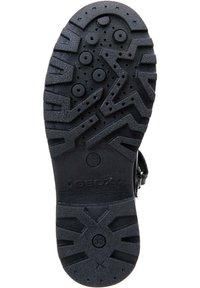 Suola di scarpa in gomma nera con un motivo di battistrada testurizzato che presenta fori circolari per la traspirabilità. Marchio Geox vicino al tallone.