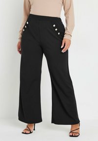 Svarta vida byxor med hög midja, med dekorativa knappar på sidorna. Slät tyg med skräddarsydd passform.