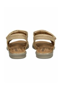 Kožené sandály v tan barvě s otevřeným zadním designem, dvojitými pásky s nastavitelnými sponami a polstrovanou podrážkou, s hladkým povrchem.