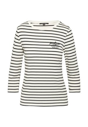Haut à manches longues blanc avec des rayures horizontales noires, présentant un col rond et un petit logo noir sur la zone gauche de la poitrine.