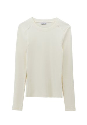 Top de punto acanalado de color crema, de manga larga, con cuello redondo y silueta ajustada, exhibido plano sobre fondo blanco.