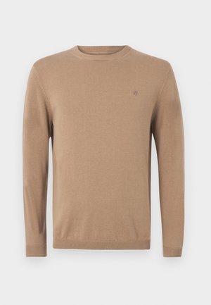 Beige knitted sweater with a crew neck, long sleeves, and a small logo on the chest. Features ribbed cuffs and hem for a snug fit.
