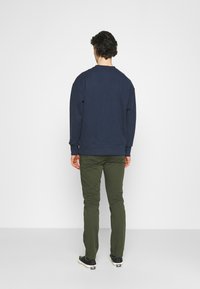 ARKET Tygbyxor - green