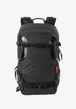 Zaino nero con tessuto a motivo a diamante, dettagli lucidi, spallacci regolabili e molteplici scomparti con zip. Presenta dettagli in metallo rosso.