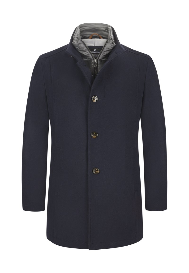 Marineblauer Mantel mit strukturiertem Design, ausgestattet mit Stehkragen, fünf vorderen Knöpfen und Seitentaschen. Das Innenfutter ist grau.