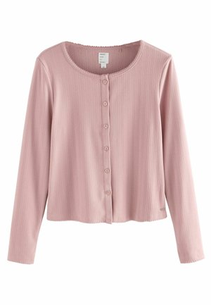 Rosa langærmet top med ribbet tekstur, rund halsudskæring og knaplukning foran. Har bølgede kanter ved nederste kant og ærmer, lavet af blødt stof.