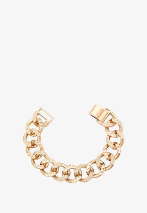 Aranyszínű lánc karkötő váltakozó sima és texturált láncszemekkel. Biztonságos csattal és robusztus dizájnnal rendelkezik, amely elegáns megjelenést kölcsönöz.