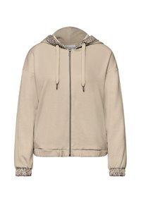 Beige lynlås-hættetrøje med leopardprint på hættens foring og ærmekanter, med snoretræk og elastisk taljebånd.