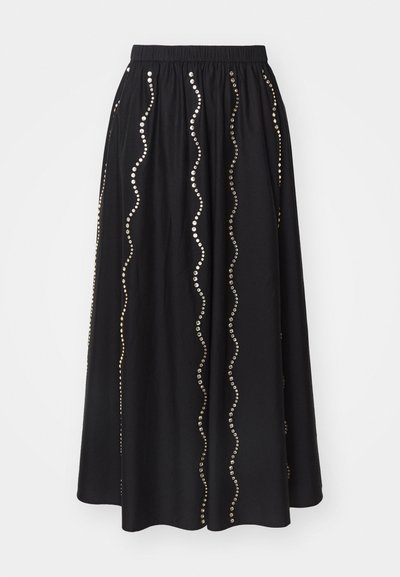 Black skirt with an elastic waistband, featuring wavy rows of gold studs along the front. Made from a soft fabric with a flowing design.