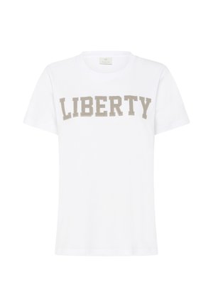 Balta kokvilnas T-kreklu ar īsām piedurknēm, uz kura krūtīm ir drukāti gaiši beidžas krāsā, bloku burti "LIBERTY".