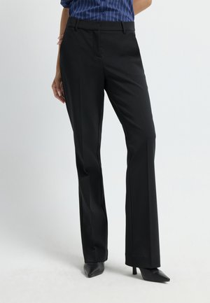 SIDE POCKET  - Trousers - black
