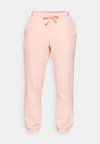 ESSENTIAL PANTS - Treniņtērpa apakšdaļas - apricot blush