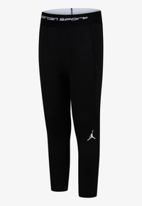 Crne sportske tajice s uskim krojem, napravljene od rastezljivog materijala. Imaju bijeli Jordan logotip i elastičnu traku s oznakom.