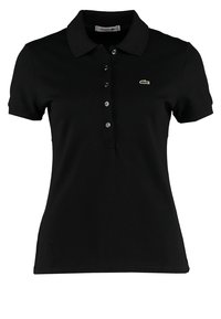 Polo noir à manches courtes avec boutons et petit logo crocodile vert sur la poitrine gauche.