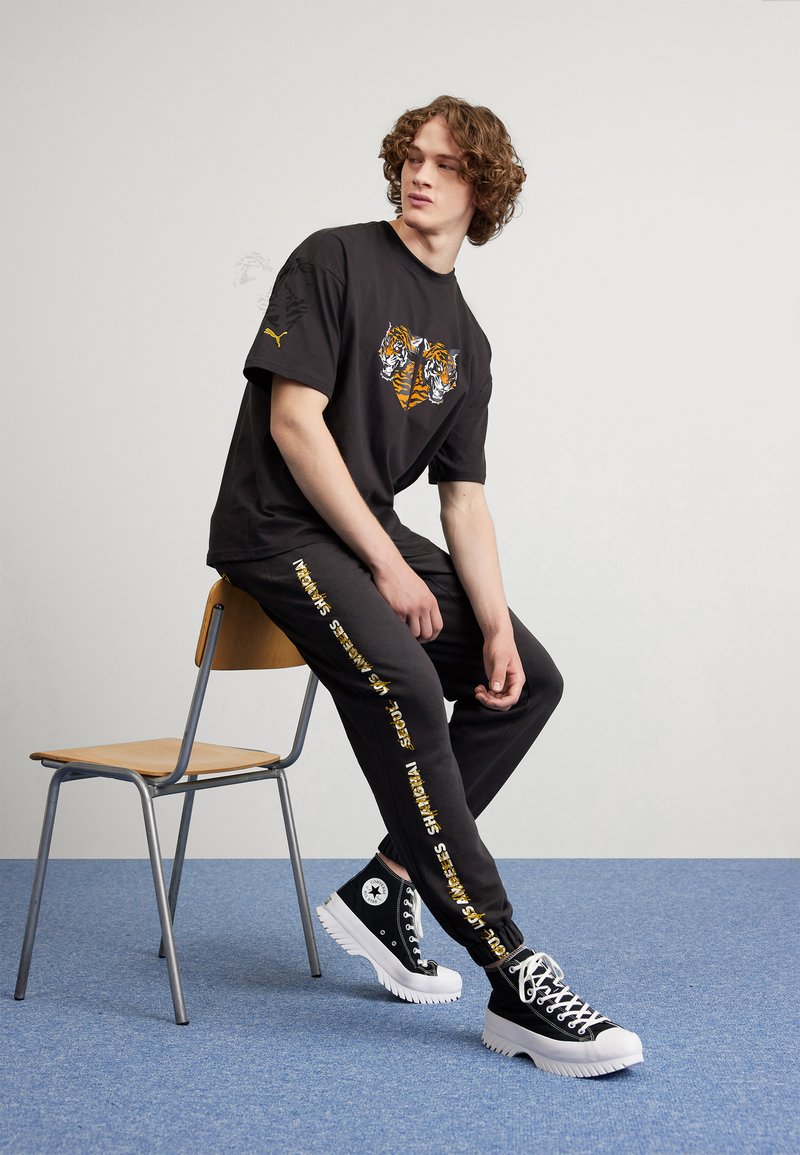 pantalon survetement puma noir