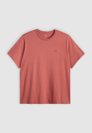 T-shirt med korte ærmer i støvet rosa farve, lavet af bomuld, med et lille rødt Levi's-logo på brystet, rund hals og en afslappet pasform.