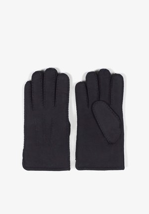 Svarta läderhandskar med en slät yta, med tre fingerdelar och en förstärkt tumme. Syt detaljer längs kanterna.