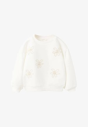 Bela majica z aplikacijami vezenih cvetličnih vzorcev v svetlo bež barvi, z izrezom okrog vratu in spuščenimi rokavi. Mehka tekstura in sproščen kroj.