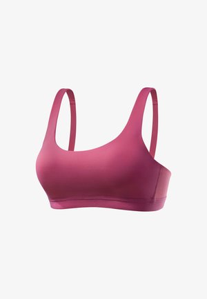 Weicher rosa Sport-BH mit dünnen verstellbaren Trägern und nahtlosem Design, gezeigt auf weißem Hintergrund.