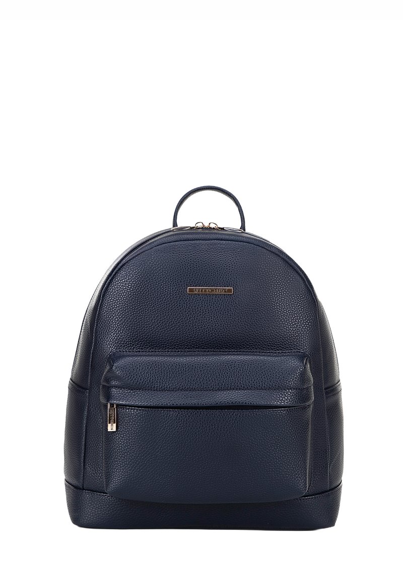 Zaino in pelle blu navy con design arrotondato, superficie testurizzata, tasca anteriore con zip e manico superiore per il trasporto.