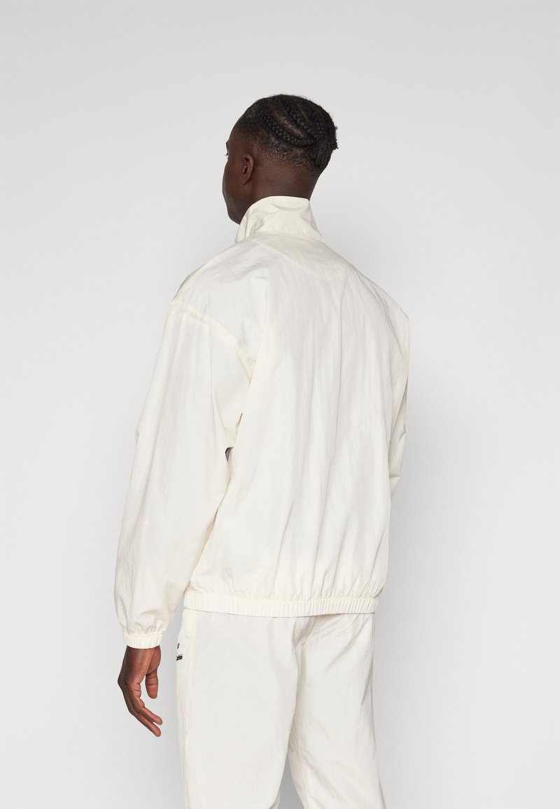 Sergio Tacchini NAYLA TRACK Training jacket gardenia navy/off