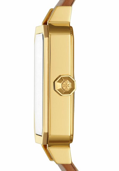 Cassa dell’orologio rettangolare in oro con corona esagonale con logo inciso, fissata a un cinturino in pelle marrone.