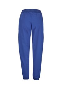 Blaue Sporthosen mit einem elastischen Bund, schmal zulaufenden Beinen und einem glatten, leichten Stoff. Sie verfügen über Seitentaschen und gerippte Bündchen.