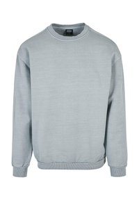 Světle šedá mikina s kulatým výstřihem, ribovanými manžetami a spodním lemem. Má hladkou texturu a uvolněný střih, vyrobená z měkké látky.