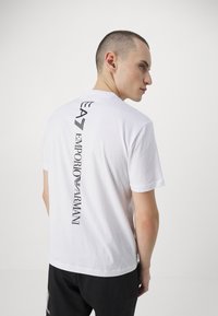 EA7 Emporio Armani Marškinėliai su spaudiniu - bianco