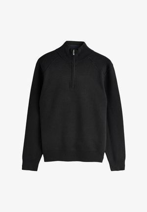 Pulover negru cu guler înalt, fermoar de un sfert și detalii striate la umeri și manșete. Confecționat dintr-un material moale și texturat.