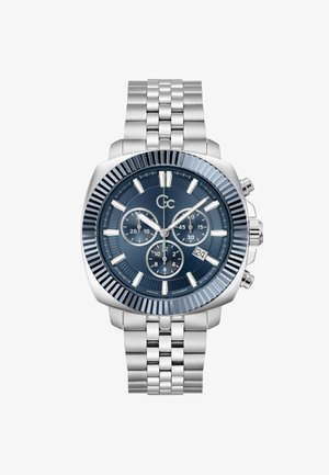 Zilveren horloge van roestvrij staal met een blauwe wijzerplaat, getextureerde bezel, drie subdials en datumvenster. Voorzien van een metalen schakelkleurige armband.