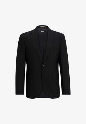 Veste noire sur mesure avec fermeture à un seul bouton, revers crantés, poches à rabat et un tissu lisse et structuré. L'intérieur est doublé.