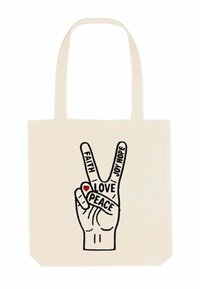 Borsa tote in tela color crema con una grafica di una mano. La mano forma un segno di pace; gli elementi testuali includono "Fede", "Amore", "Gioia" e "Pace". Dettaglio di un cuore rosso.