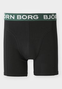 Crne bokserske gaće izrađene od glatke tkanine. Imaju zeleni elastični pojas s natpisom "BJÖRN BORG" u bijeloj boji. Dizajnirane za udobnost i savršeno pristajanje.