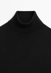 Black turtleneck sweater featuring a ribbed texture, a fitted design, and a high collar, made from a smooth, stretchy material.