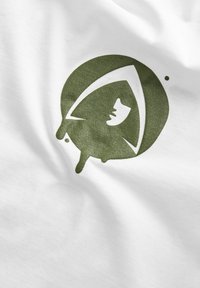 Hvid bomuldsstof med et grønt grafisk design, der viser et ansigt inden i en cirkel med dråber og en spids accent over hovedet.
