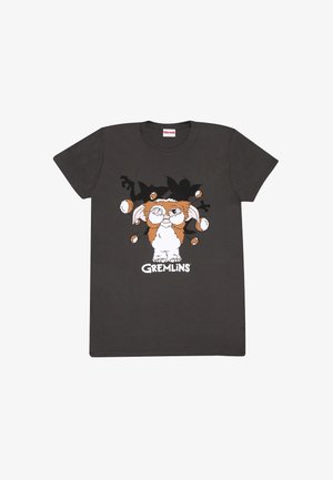 Dunkelgraues Baumwoll-T-Shirt mit einem Grafiken von einem Wesen mit orangefarbener und weißer Fell, das sein Gesicht hält, und dem Text "GREMLINS" darunter.