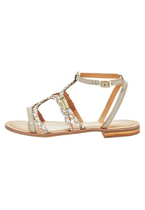 Flat sandals featuring light gray leather straps with woven detail, a tan insole, and a small heel. Closure includes a gold buckle accent.
