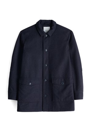 Navy blue jacket made of textured fabric, featuring a button-down front, a collar, and two large front pockets with button closures.