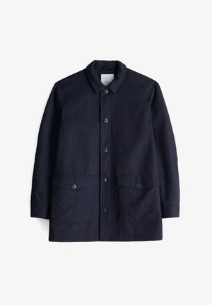 Marineblaue Jacke aus strukturiertem Stoff, mit Knopfverschluss, Kragen und zwei großen Vorderaschen mit Knopfverschlüssen.