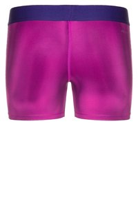 Dri-FIT uintivarat uima shorts vaaleanpunaisena, jossa on sileä pinta, tummansinisellä joustavalla vyötärömäisella ja minimaalista ompelu yksityiskohtia.