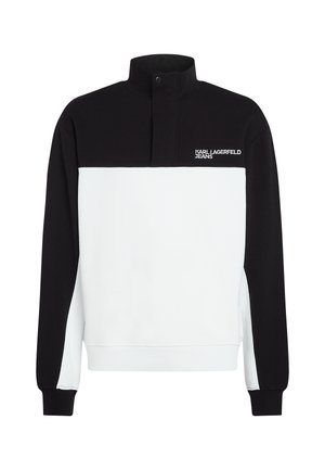 Pullover felpa bianca e nera con colletto alto, caratterizzata da una parte superiore nera e una parte inferiore bianca. Logo sul lato sinistro del petto.