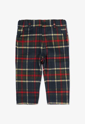 Pantaloni tartan con base blu navy, caratterizzati da motivi a quadri rossi, verdi e gialli. Realizzati in tessuto morbido con due tasche frontali e chiusura con un solo bottone.