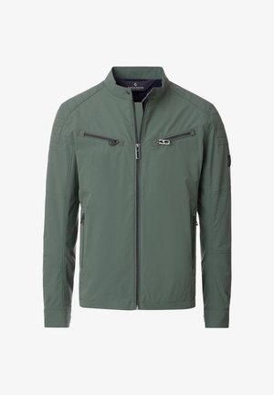 Oliivinvihreä rento miesten takki pystykauluksella, edessä vetoketju, kaksi vaakasuoraa rintataskua vetoketjuilla ja kaksi sivutaskua vetoketjuilla.