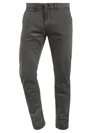 Gray cotton trousers with a slim fit, featuring a zip fly, button closure, and front pockets. Subtle textured pattern throughout.